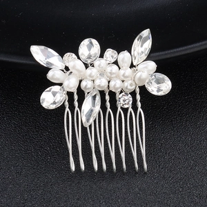 Handmade bridal hair comb featuring white pearls and clear crystals on silver metal wire