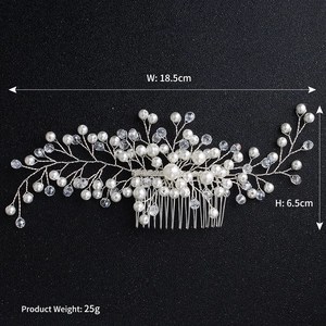 Detail view of pearl and crystal bridal hair comb showing 18.5cm width measurements