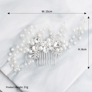 Macro detail of bridal hair comb with pearls and crystals measuring 15cm by 8cm
