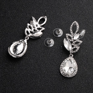 Detailed view of luxury bridal teardrop crystal earrings with silver metal base and backings