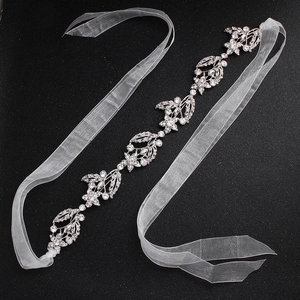 Exquisite bridal hairband with sparkling rhinestones and silver floral vine detail