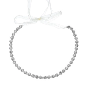 Detail of silver rhinestone bridal belt with sheer organza ribbon on white background