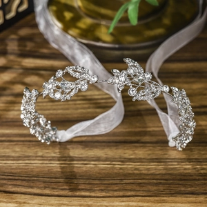 Silver bridal headband with crystal flowers and leaves on white organza ribbon