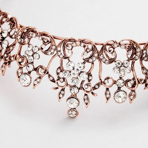 Vintage rose gold bridal tiara with flower rhinestone details and sparkling crystals