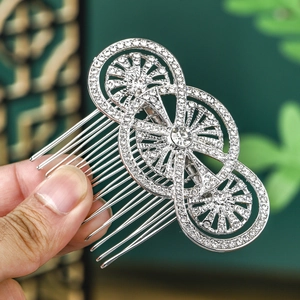 Elegant vintage bridal hair comb with interlocking rhinestone circles in silver finish