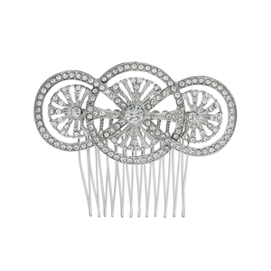 Vintage silver bridal hair comb with interlocking rings and sparkling white rhinestones