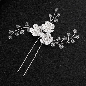 Elegant handmade bridal hair pin with white ceramic flowers and clear crystal beads