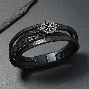 Men's vintage compass leather bracelet with black braided cords and magnetic clasp