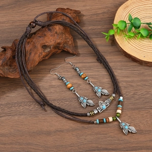 Parure collier en cuir turquoise vintage et boucles d'oreilles tête de taureau bois