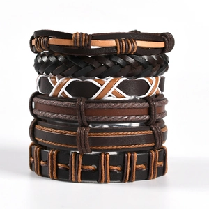 Set of six handcrafted punk owl wing braided leather bracelets in multi-layer styles