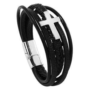 Detail of multilayer woven leather bracelet with silver cross and magnetic clasp