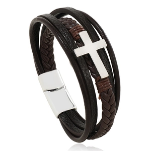Men's multi-layer woven leather bracelet featuring a polished silver cross and magnetic clasp