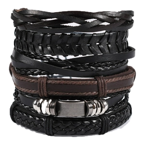 Set of 6 punk style braided leather bracelets featuring owl wing charms and metal accents