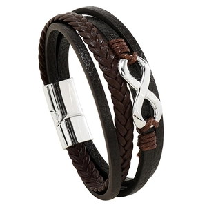 Macro shot of men's leather bracelet showing magnetic clasp and infinity symbol detail