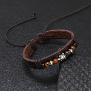 Bracciale multistrato in pelle marrone con tartaruga e perline occhio di tigre vintage