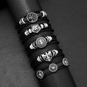 Men's five-piece black leather skull bracelet set with adjustable tiger and lion charms