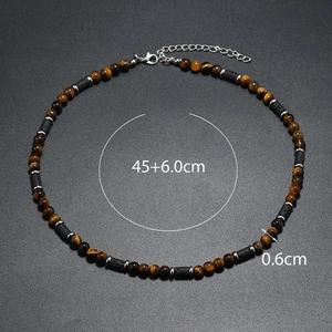 Dettaglio collana in occhio di tigre e pietra lavica con catena estensione 45+6cm
