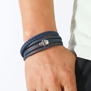 Men's blue multi-layer braided leather bracelet with silver skull charm and magnetic clasp