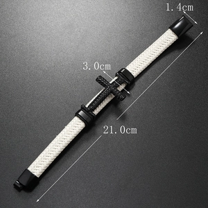 Close-up of white woven leather bracelet with black cross and detailed size dimensions