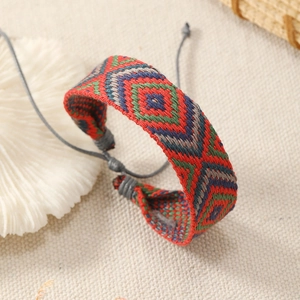 Bohemian handmade woven bracelet with geometric patterns and adjustable cord