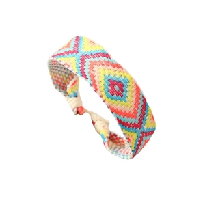 Handmade Bohemian woven friendship bracelet with colorful geometric patterns and adjustable cord