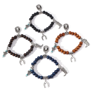 Western style beaded bracelet set with cowboy hat, boot, and lucky horseshoe charms