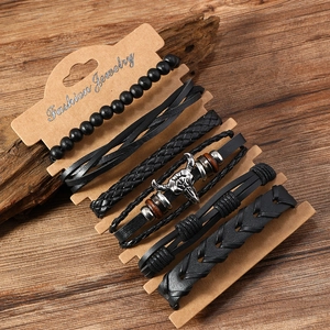 Detailed shot of a 6-piece men's vintage leather bracelet set with alloy bull head charm
