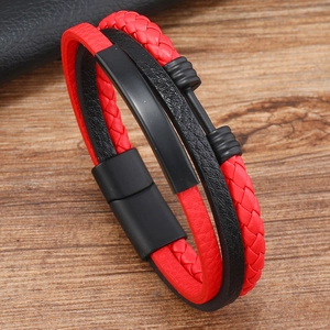 Detail of red and black multi-layer leather bracelet with matte black magnetic buckle