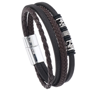 Men's multi-layer leather bracelet with silver skull charms and magnetic clasp