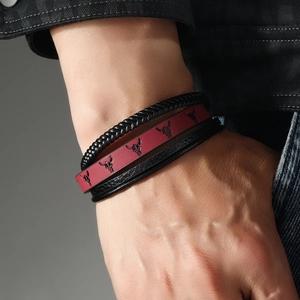 Men's western style braided leather bracelet with bull head print and magnetic clasp