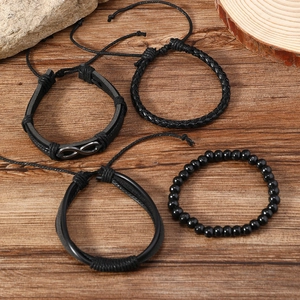 Men's retro 4-piece multilayer leather bracelet set with infinity charm on wood background