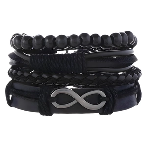 Men's multi-layer black leather bracelet set with silver infinity symbol on white backdrop
