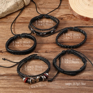 Detailed view of 5-piece braided leather bracelets with star and butterfly charms