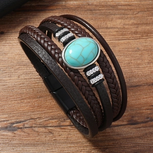 Detail of multi-layer leather bracelet with turquoise stone and magnetic clasp