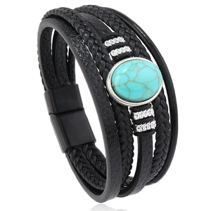 Close-up of multilayer leather bracelet featuring turquoise stone and magnetic buckle