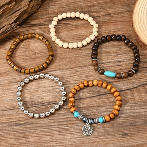 Handmade turquoise and wood bead bracelet set with retro flower pendant in 5 pieces