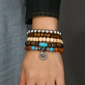 Handmade Bohemian turquoise flower bead bracelet set with multi-layer elastic cord style