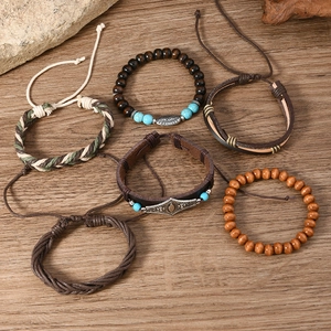 Detail of 6-piece bohemian beaded bracelet set with wood, leather, and turquoise beads