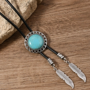 Vintage Bolo tie with turquoise gemstone, braided black cord and silver feather pendants