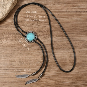 Detail of western bolo tie featuring turquoise stone and feather pendant measurements