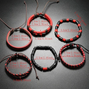 Detail of 6-piece men's beaded bracelet set featuring red and black woven leather and cords