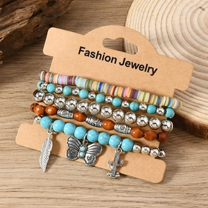 Bohemian multilayer bracelet set featuring turquoise beads, cactus and butterfly charms