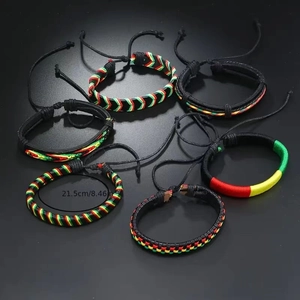 Detailed view of 6-piece woven leather bracelets set showing 21.5cm length and rasta colors