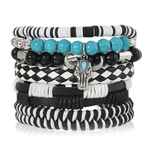 Detail of Bohemian multi-layer bracelet set featuring a metallic bull head charm and beads