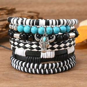 Bohemian multilayer bracelet set featuring turquoise beads and vintage metal bull head pendant