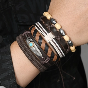 Close-up of Bohemian 6-piece bracelet set with turquoise beads and feather charms