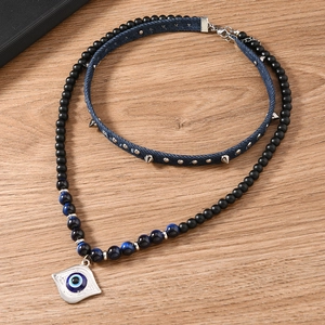 Bohemian two-piece evil eye necklace set with blue denim choker and beaded pendant