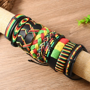 Jamaica style braided bracelet set with reggae red yellow and green woven leather cords