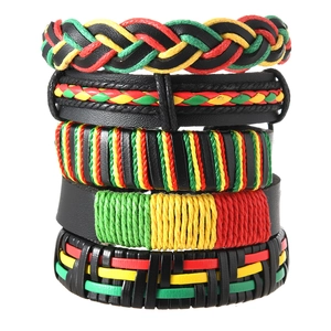 Detail view of five multilayered Rasta style hand-woven leather and cord bracelets