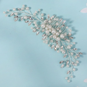 Elegant bridal hair comb with white pearls and sparkling marquise rhinestones on blue base